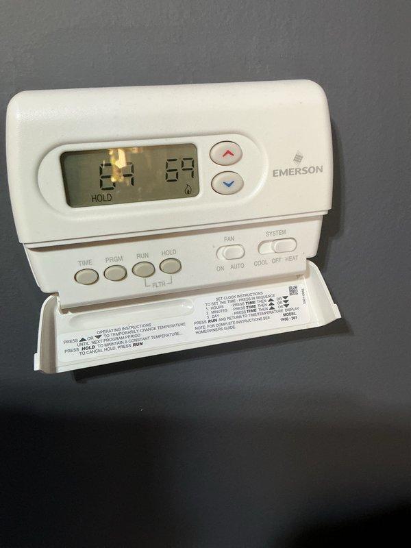 Completed comprehensive Gold AC inspection on 6-year-old residential split system with basement-mounted air handler. Performed full system evaluation including thermostat operation verification, condenser unit inspection, electrical disconnect examination, and visual assessment of all accessible components. Unit found operating properly with thermostat maintaining programmed temperature settings, outdoor condenser showing clean coils and proper airflow, and all safety controls functioning as designed.