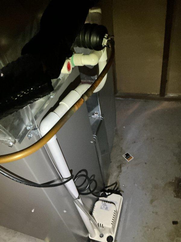 Completed AC system startup on basement coil and outdoor condensing unit. Performed initial system inspection, verified proper refrigerant connections at evaporator coil, checked electrical connections and condensate drainage, and confirmed operational status of both indoor and outdoor equipment components.