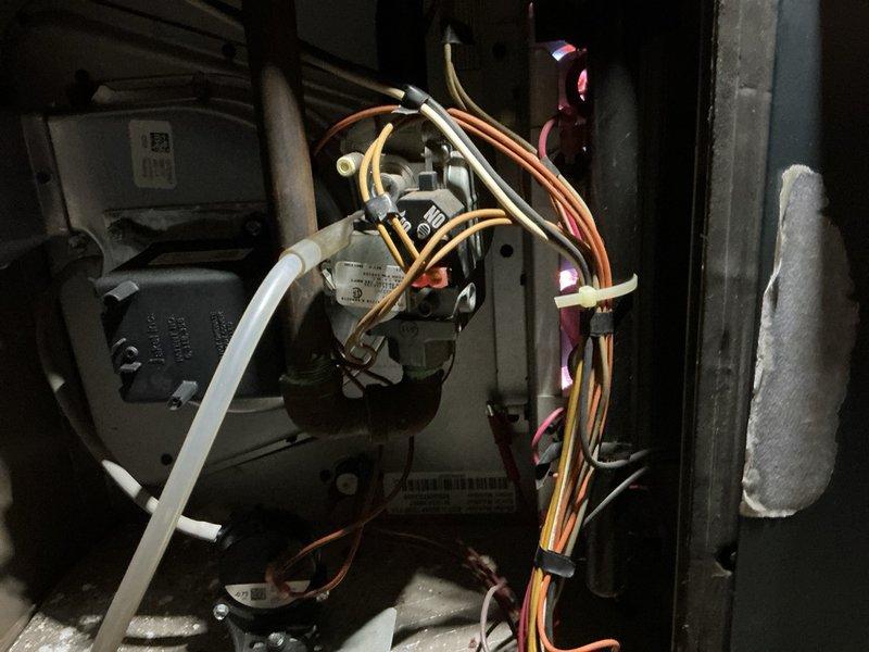 Responded to no heat call for attic-mounted furnace unable to maintain temperature above 68 degrees. Upon inspection, performed diagnostic testing of electrical components and control circuits using digital multimeter. Identified issue with heating relay and associated control wiring. Tested voltage readings across multiple connection points to verify proper system operation. Inspected furnace cabinet interior, control board connections, and thermostat wiring to ensure all components functioning correctly. System restored to proper operation with unit now achieving desired temperature setpoint.