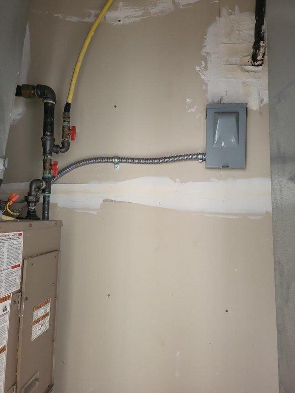 Completed on-site assessment for Magic Pack heating and cooling unit replacement in owner-occupied apartment with balcony-mounted equipment of unknown age. Documented existing HVAC system configuration, including interior utility space connections, ductwork layout, water heater proximity, gas line routing, and electrical panel location. Provided comprehensive replacement quote based on current equipment condition and installation requirements.