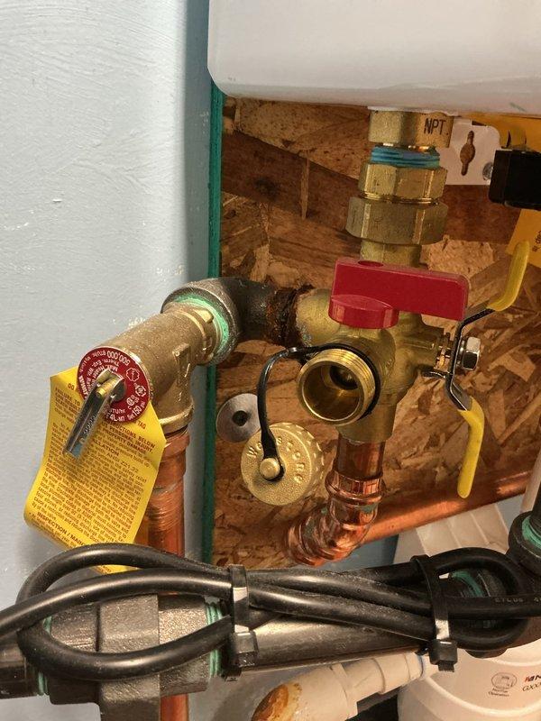Responded to tankless water heater service call following HVAC technician assessment. Replaced three-quarter inch copper piping components including pro press 90-degree fitting, 45-degree fitting, and coupling with approximately 12 inches of new three-quarter inch pipe. Installed new tankless water heater isolation valves to ensure proper system operation and maintenance access. Brought tankless flush kit on-site and offered descaling service to homeowner. Upon inspection, verified water quality conditions were favorable with minimal scale buildup observed on related equipment. Tested all connections for leaks, confirmed proper valve operation, and verified system functionality upon completion.