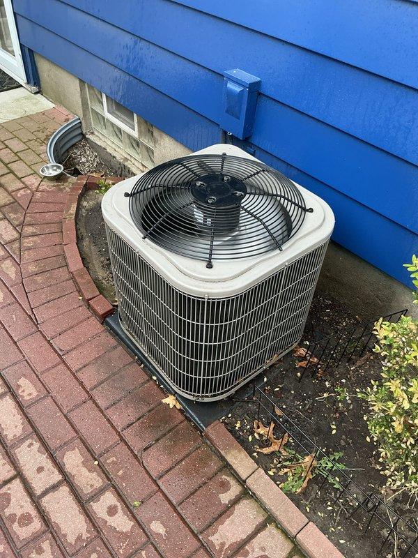 Completed prepaid HVAC maintenance inspection on residential air conditioning system as part of plan membership. Performed comprehensive AC tune-up including visual inspection of outdoor condenser unit, verified proper placement on concrete pad, checked electrical connections and conduit routing, inspected fan assembly and grille condition, and assessed unit exterior for damage or wear. Noted minor debris accumulation around unit base and some vegetation growth near foundation; condenser operating within normal parameters with no immediate service concerns identified at time of inspection.