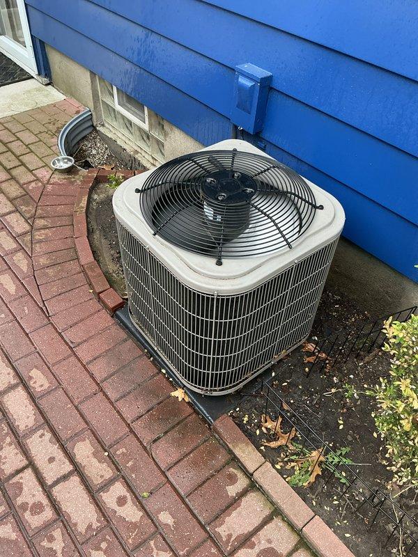 Completed prepaid HVAC maintenance inspection on residential air conditioning system as part of plan membership. Performed comprehensive AC tune-up including visual inspection of outdoor condenser unit, verified proper placement on concrete pad, checked electrical connections and conduit routing, inspected fan assembly and grille condition, and assessed unit exterior for damage or wear. Noted minor debris accumulation around unit base and some vegetation growth near foundation; condenser operating within normal parameters with no immediate service concerns identified at time of inspection.