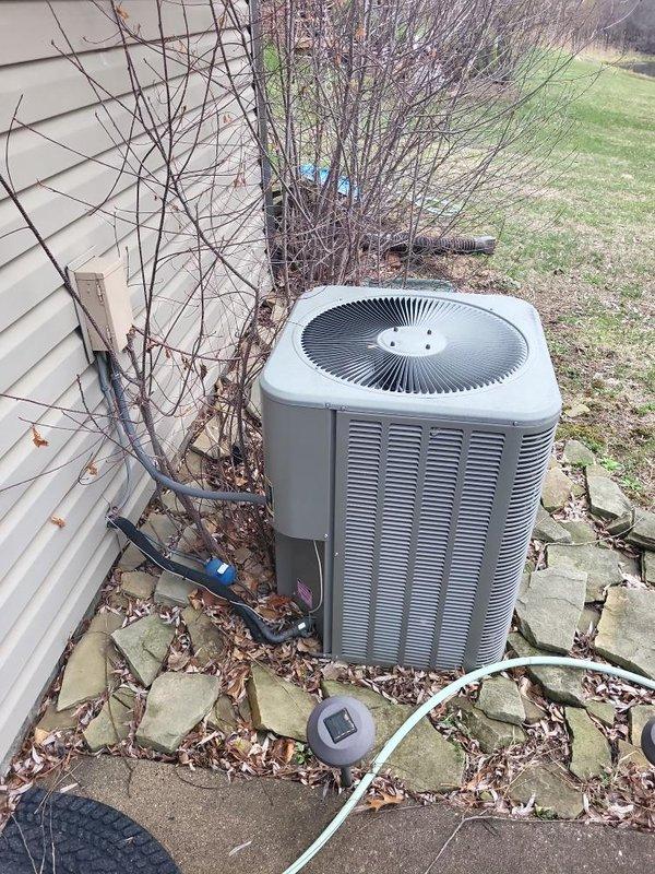 Completed estimate for replacement of 10-year-old air conditioning system including outdoor condensing unit and indoor evaporator coil located in basement. Evaluated existing electrical panel with dedicated AC circuit breakers and assessed current outdoor unit positioned on concrete pad adjacent to home foundation. Provided comprehensive replacement quote for complete system upgrade with new equipment installation.