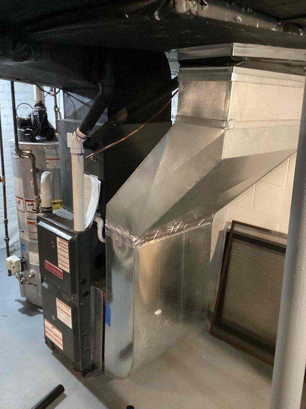 Conducted on-site assessment for AC condenser relocation project from rear of property to side yard location. Evaluated existing electrical disconnect, refrigerant line routing, and condensate drain configuration to determine scope of work required for complete unit repositioning. Documented current indoor air handler and furnace installation in basement mechanical room, noting existing ductwork layout and electrical connections that will remain unaffected by exterior condenser relocation. Provided comprehensive estimate for disconnect and reconnection of refrigerant lines, electrical service, and all associated components necessary to safely relocate outdoor condensing unit to proposed side yard location while maintaining system integrity and code compliance.