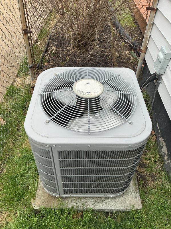Completed comprehensive Gold AC Inspection and tune-up on residential split-system air conditioning unit as part of plan membership maintenance. Performed full system evaluation of outdoor condenser unit, inspected fan motor assembly and blade operation, verified proper airflow through louvered coil housing, checked electrical connections at disconnect box, and assessed unit placement and clearances in side yard installation. All components found operating within normal parameters with no immediate service needs identified.