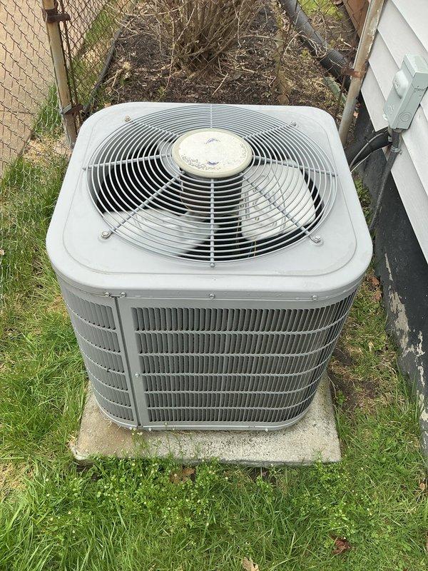 Completed comprehensive Gold AC Inspection and tune-up on residential split-system air conditioning unit as part of plan membership maintenance. Performed full system evaluation of outdoor condenser unit, inspected fan motor assembly and blade operation, verified proper airflow through louvered coil housing, checked electrical connections at disconnect box, and assessed unit placement and clearances in side yard installation. All components found operating within normal parameters with no immediate service needs identified.