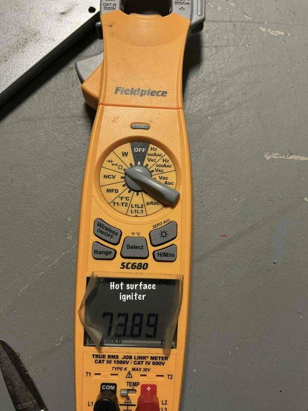 Performed comprehensive tune-up and inspection on 5-year-old furnace located in basement and 15-year-old air conditioning unit located outside as part of late season maintenance special. Conducted electrical diagnostics using clamp meter, measuring amperage draw and testing hot surface igniter which registered 7389 ohms resistance, confirming proper operation within manufacturer specifications. Completed full system evaluation including visual inspection of both heating and cooling equipment, verified all electrical connections, and confirmed all components functioning properly with no immediate repairs required.