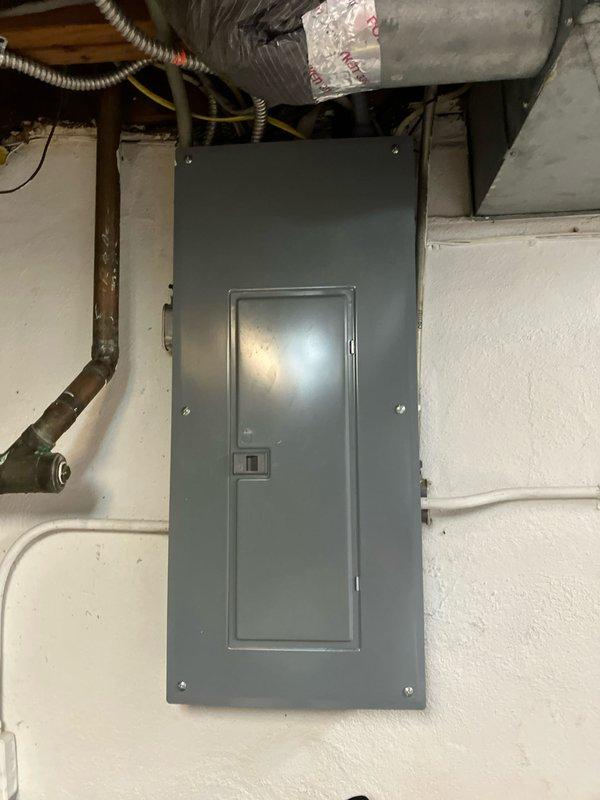 Responded to service call for 30-year-old furnace in basement making loud motor noise that required emergency shutdown. Performed diagnostic evaluation of heating system, assessed equipment condition, and documented existing Honeywell Chronotherm III programmable thermostat and electrical panel configuration. Provided replacement estimate for furnace system due to age and mechanical failure of motor components.