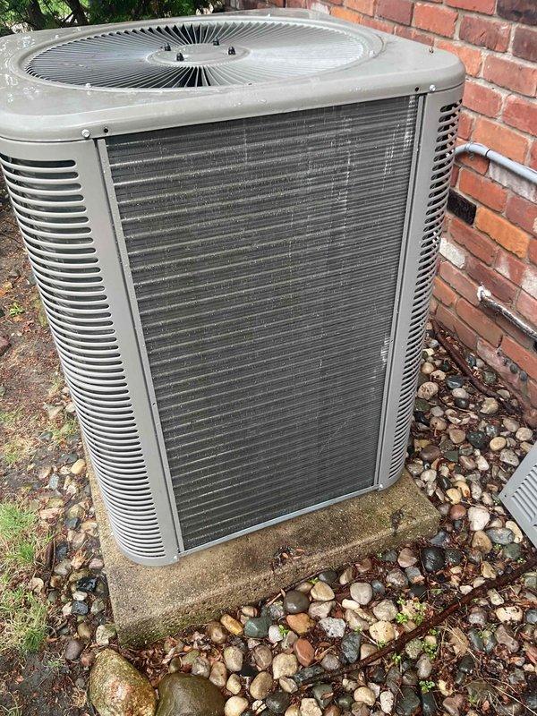 Completed routine AC inspection on 4-year-old residential condensing unit. System operational with all components functioning within normal parameters. Inspected electrical compartment, verified capacitor connections and wiring integrity, and confirmed proper outdoor unit operation.