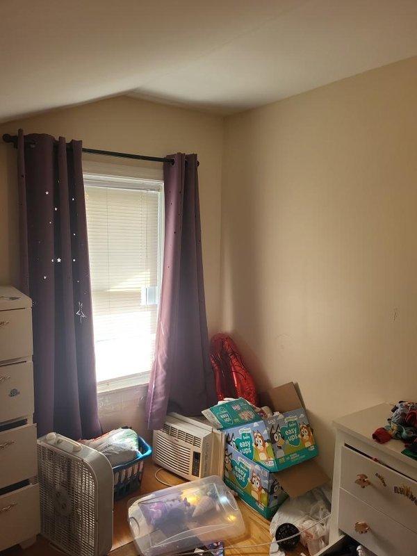 Conducted on-site evaluation for replacement of 15-year-old steam furnace and window air conditioning units with a 3-zone ductless heat pump system. Assessed proposed indoor unit locations in living spaces including bedroom area currently served by window AC unit, confirmed electrical panel capacity and breaker availability for new system installation, and discussed outdoor unit placement options with property owner. Documented existing equipment conditions and photographed installation areas to prepare comprehensive estimate for ductless mini-split heat pump conversion.