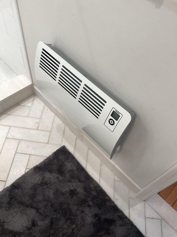 Successfully installed a Cadet Con 150-2 electric baseboard heater (115V) in the bathroom adjacent to the family room, including complete electrical wiring and connection. Installed approximately 12 feet of line hide to conceal exposed refrigerant lines in the family room and completed repairs to existing exterior line hide. All installations tested and verified operational, with heating unit properly mounted and functioning according to manufacturer specifications.