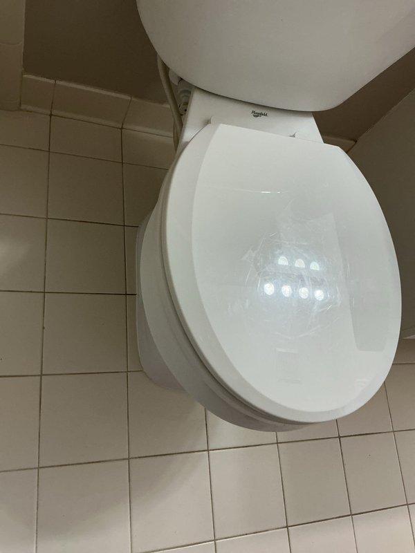 Responded to water leak complaint affecting first-floor condo unit originating from second-floor bathroom. Diagnosed leak source as failing toilet seal on upper level. Removed existing toilet, inspected flange and subfloor for water damage, and installed new toilet with wax ring seal to eliminate active leak and prevent further water intrusion to unit below.