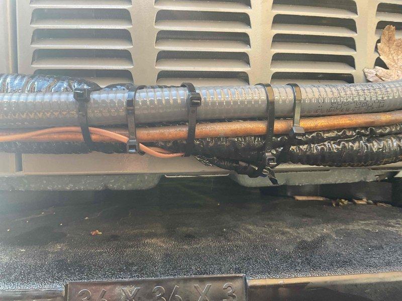 Completed AC system startup for basement evaporator coil installation. Verified proper refrigerant line connections with appropriate insulation materials secured at outdoor condensing unit. Inspected electrical connections, control board wiring, and component operation. System tested and confirmed operational.