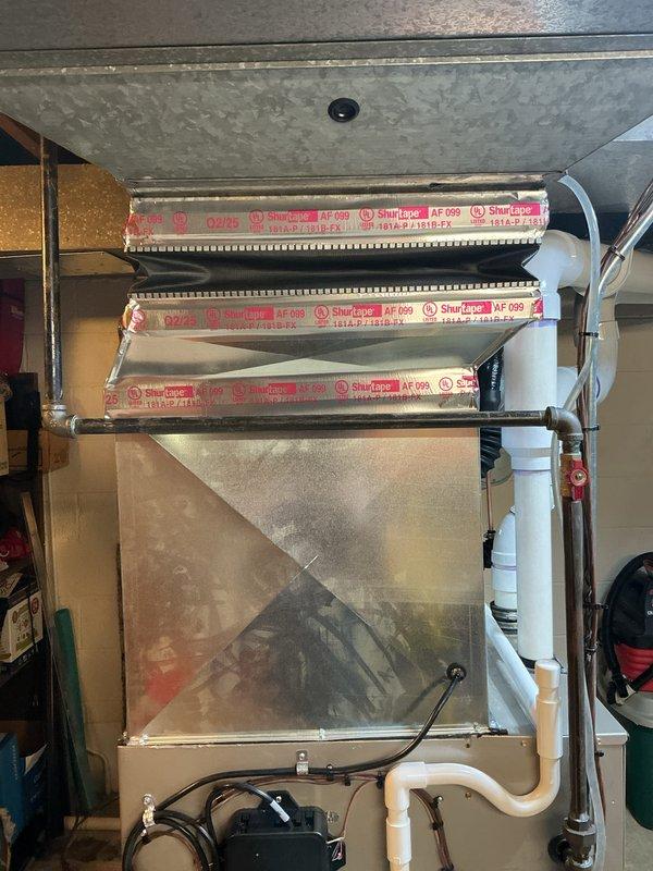 Completed installation of 3.5-ton air conditioning system with matching evaporator coil in left-side configuration. Installed new air handler unit with ShurGard filtration system, established proper condensate drainage using PVC piping with safety switch, and made all necessary electrical connections including control relays. Reconnected existing electrical service, verified proper airflow through filter assembly, and confirmed all mechanical components were securely mounted and operational per manufacturer specifications.