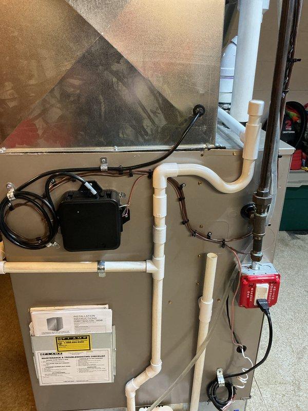 Completed installation of 3.5-ton air conditioning system with matching evaporator coil in left-side configuration. Installed new air handler unit with ShurGard filtration system, established proper condensate drainage using PVC piping with safety switch, and made all necessary electrical connections including control relays. Reconnected existing electrical service, verified proper airflow through filter assembly, and confirmed all mechanical components were securely mounted and operational per manufacturer specifications.