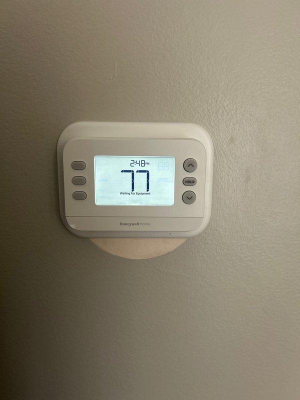 Completed installation of 2.5-ton air conditioning system with matching evaporator coil on left side of residence. Reconnected all electrical and refrigerant lines, verified thermostat operation and system functionality, and confirmed proper equipment communication. Mechanical, electrical, and air conditioning permits were requested and system was tested to ensure optimal performance upon startup.