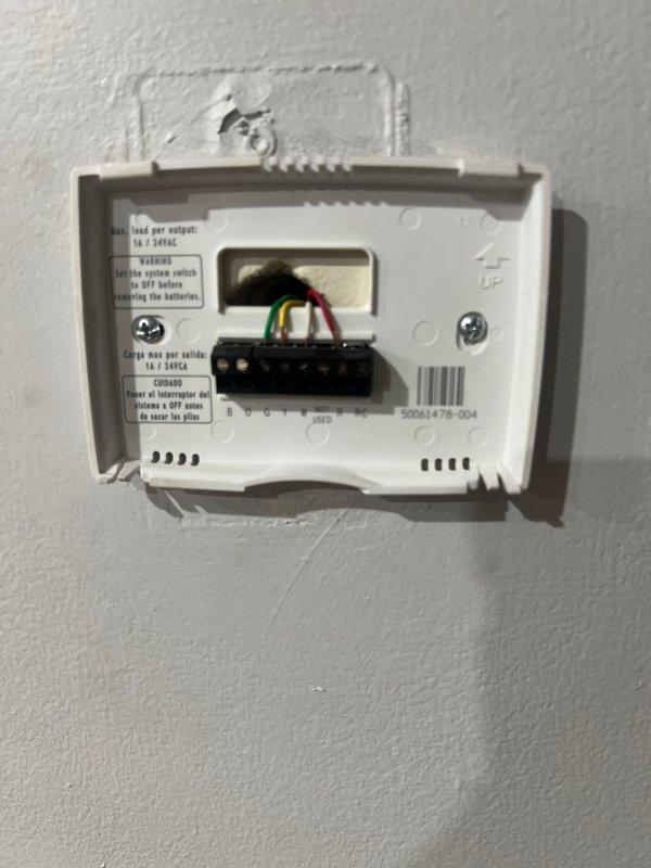 Completed full installation of 2-ton air conditioning system with matching evaporator coil at rear location. Installed new Honeywell Home programmable thermostat with proper wiring configuration and tested all control functions. Coordinated with electrical contractor for new dedicated circuit installation to meet code requirements. System includes humidifier integration and condensate pump. All mechanical and electrical permits obtained and work performed to current code standards. Verified proper airflow through return air plenum after remeasurement and modifications. Unit commissioned successfully with all components operating within manufacturer specifications.