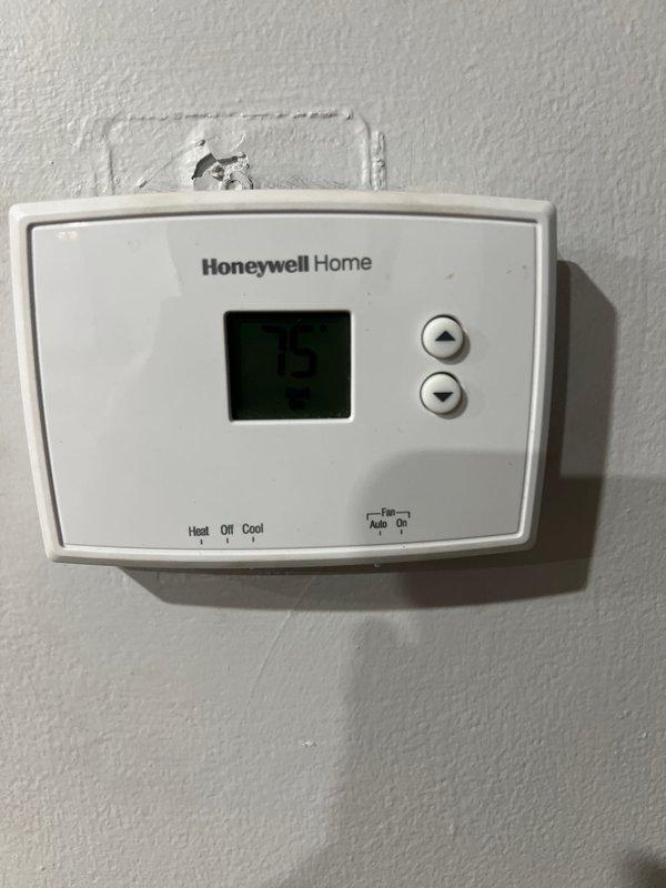 Completed full installation of 2-ton air conditioning system with matching evaporator coil at rear location. Installed new Honeywell Home programmable thermostat with proper wiring configuration and tested all control functions. Coordinated with electrical contractor for new dedicated circuit installation to meet code requirements. System includes humidifier integration and condensate pump. All mechanical and electrical permits obtained and work performed to current code standards. Verified proper airflow through return air plenum after remeasurement and modifications. Unit commissioned successfully with all components operating within manufacturer specifications.