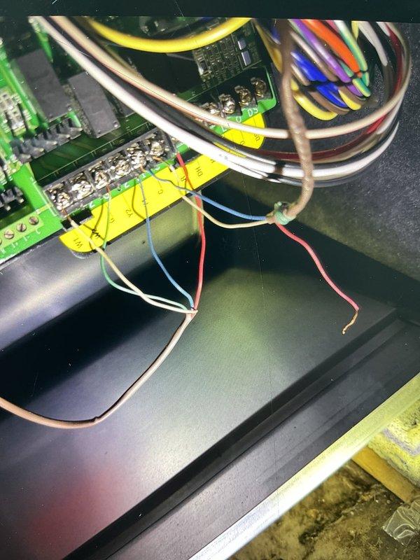 Performed system startup on newly installed air conditioning unit. Completed electrical connections and control wiring within junction box, verified all circuit board connections and terminal points, and installed 20x25x5 filter as specified. System tested and operational.