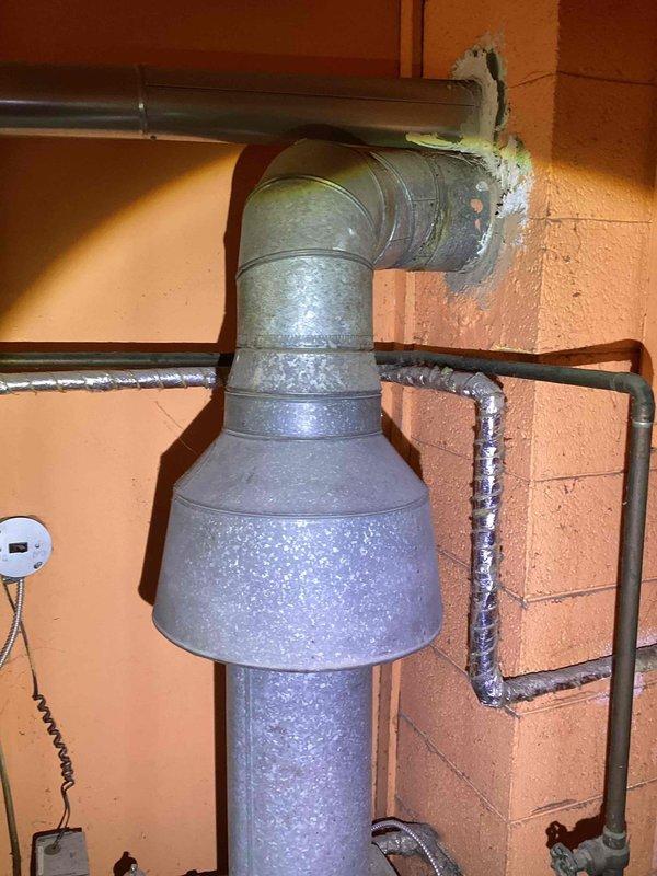 Responded to service call for reported gas odor and general inspection of aging 1960s-era boiler system. Conducted thorough leak detection testing throughout boiler and associated gas piping with no active leaks identified at time of inspection. Evaluated overall condition of existing boiler system, noting advanced age and deterioration of components. Documented existing heating system configuration including hot water boiler, associated piping, and distribution system. Provided comprehensive estimate options for complete system replacement, including both replacement with new boiler system and alternative conversion to forced air heating system. Photographed existing equipment and installation conditions for estimate documentation purposes.