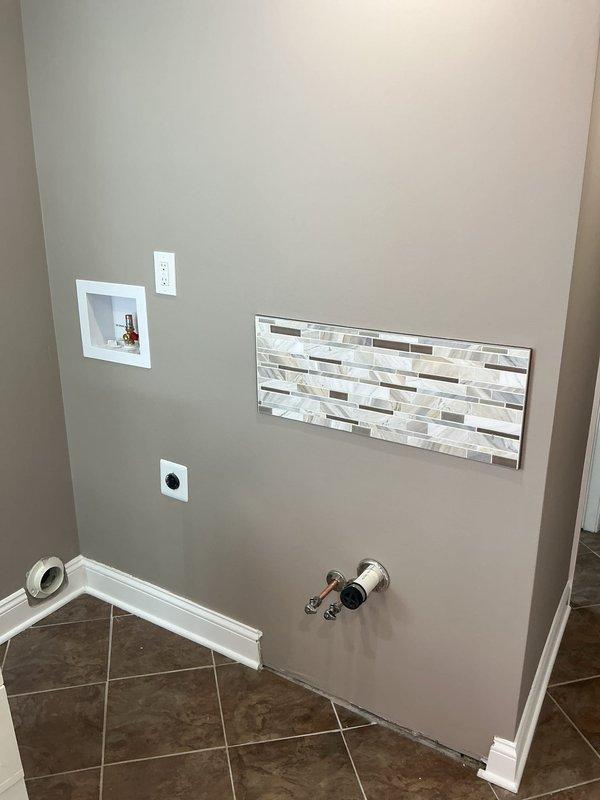 Returned to site following successful inspection to complete bathtub installation as specified in original scope of work. Finalized all plumbing connections, verified proper drainage and water supply function, and documented completed installation with comprehensive before and after photography per project requirements.