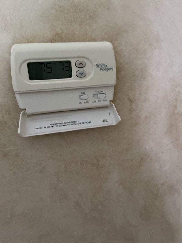 Completed comprehensive Gold AC inspection on a dual-zone residential HVAC system with 7-year-old equipment. Accessed attic-mounted air handler via pull-down ladder and inspected downstairs unit, performing full system evaluation including refrigerant levels, electrical connections, condensate drainage, air filter condition, and thermostat operation. Both units found to be operating within normal parameters with no immediate service needs identified.
