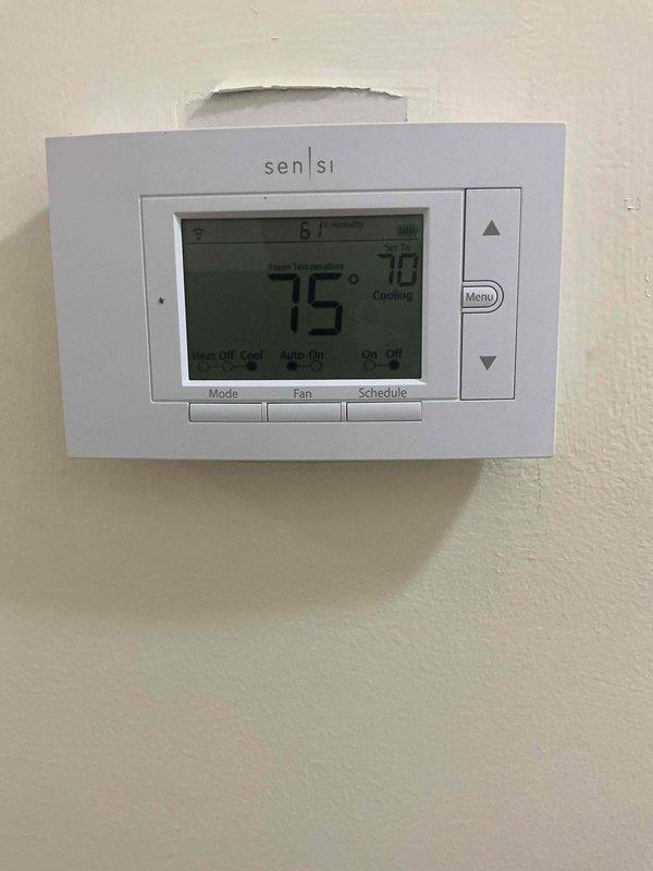Responded to customer request for assistance with AC system operation on 4-month-old equipment located in basement. Provided instruction on proper thermostat operation and system startup procedures for the Sensi digital thermostat and outdoor Xonnet condensing unit. Verified system functionality with cooling mode engaged, confirmed proper communication between thermostat and equipment, and ensured customer understood basic system controls and settings.