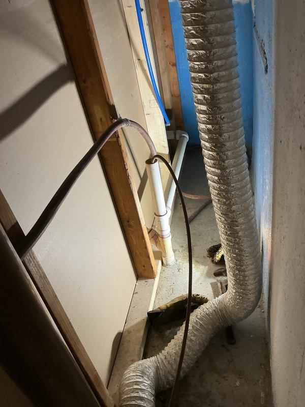 Responded to recurring weekly basement flooding in a 1965-era home with no existing sump pump system. Assessed the basement area and determined the source of water intrusion, then installed a new sump pump system to prevent future flooding events. Configured drainage system with appropriate discharge piping and flexible ducting to route water away from the foundation, ensuring proper pump operation and basement protection.