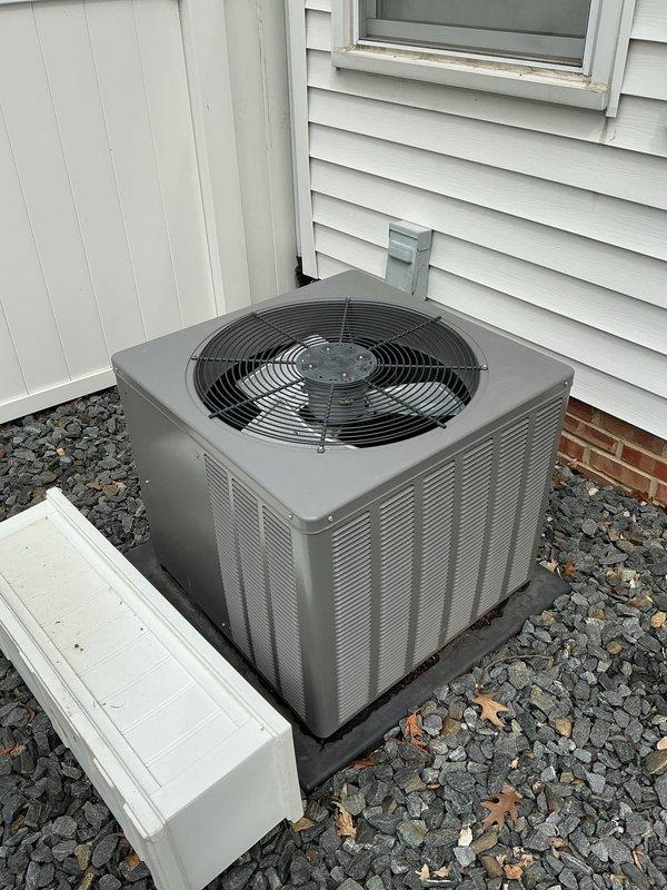 # HVAC Service Call - No Cool Condition

Responded to service call for 10-year-old air conditioning system with complete failure to operate. Upon arrival, located outdoor condenser unit positioned on gravel pad in backyard against exterior wall of residence.

## Diagnostic Procedures

Performed visual inspection of condenser unit exterior. Unit showed normal wear consistent with age, with no obvious physical damage to cabinet, fan grille, or mounting pad. Checked electrical supply at disconnect and verified power availability to equipment.

Utilized digital multimeter to test electrical components and measure voltage readings at various test points. Display reading of 069 captured during diagnostic testing indicated specific voltage or resistance measurement taken during troubleshooting process. Conducted systematic electrical diagnostics to isolate failure point in system.

## Findings

Determined root cause of no-cool condition through electrical testing protocols. System age of 10 y