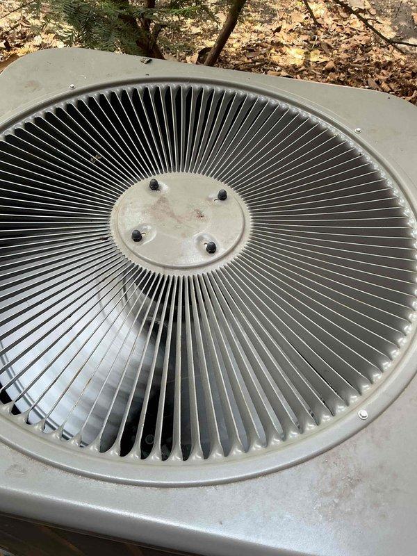 Completed comprehensive Gold AC inspection on a two-unit residential HVAC system with equipment under 10 years old. Inspected Lennox air handler located in basement, verifying proper refrigerant line connections, condensate drain operation with trap and PVC discharge lines, and overall system integrity within insulated enclosure. Examined outdoor condenser unit, confirming fan assembly operation, evaluating exterior condition showing normal weathering, and noting operational status of all components with both systems functioning properly at time of inspection.