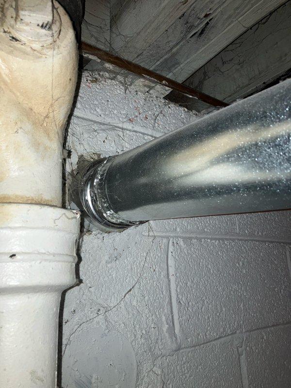 Provided estimate for replacement of 70-gallon hot water tank located in basement. Current unit is 11+ years old and still operational but nearing end of service life. Assessed existing plumbing configuration including copper supply lines, PVC venting, gas connections, and associated mechanical infrastructure to determine replacement specifications and installation requirements.