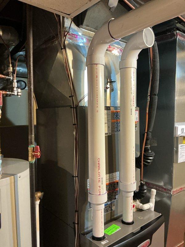 Responded to no cooling complaint on 3-month-old Lennox air conditioning system with outdoor condenser and basement-located air handler. Performed diagnostic evaluation of both indoor and outdoor units, inspecting refrigerant lines, electrical connections, condensate drainage system, and airflow components. System found to be operating within normal parameters after thorough inspection and testing of all major components.