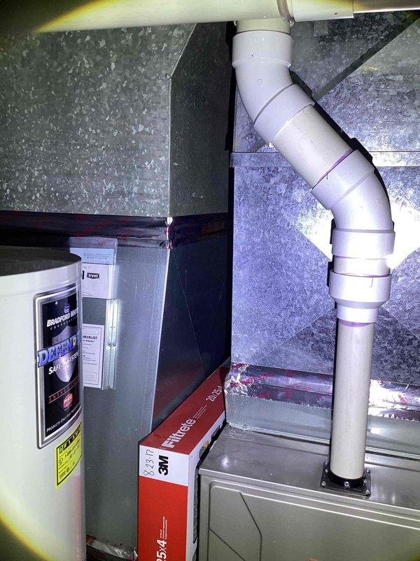 Conducted site assessment for air conditioning replacement estimate in basement mechanical room where existing 10+ year old unit is non-operational. Evaluated current HVAC infrastructure including natural gas furnace, ductwork distribution system, electrical panel capacity, and condensate drainage configuration. Documented equipment specifications and spatial constraints to develop comprehensive replacement proposal.