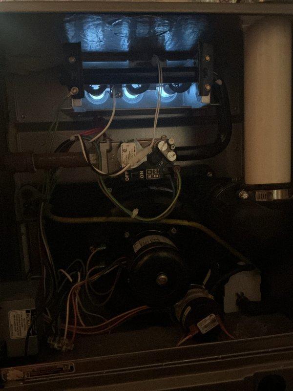 Completed comprehensive Gold Furnace Inspection on a single basement-located heating unit over 10 years of age. Performed thorough examination of all furnace components including burner assembly, ignition system, blower motor, control board, and electrical connections. Verified proper operation of the REME-HALO air purification system mounted on the ductwork, confirming secure installation and UV light functionality. Inspected flame sensors, heat exchanger, and gas valve operation. All safety controls, including high-limit switches and rollout protection, tested and verified operational. Blower motor and capacitor inspected for proper function. System cycling confirmed normal with proper ignition sequence and blue flame pattern observed. Unit operating within manufacturer specifications with no immediate service needs identified.
