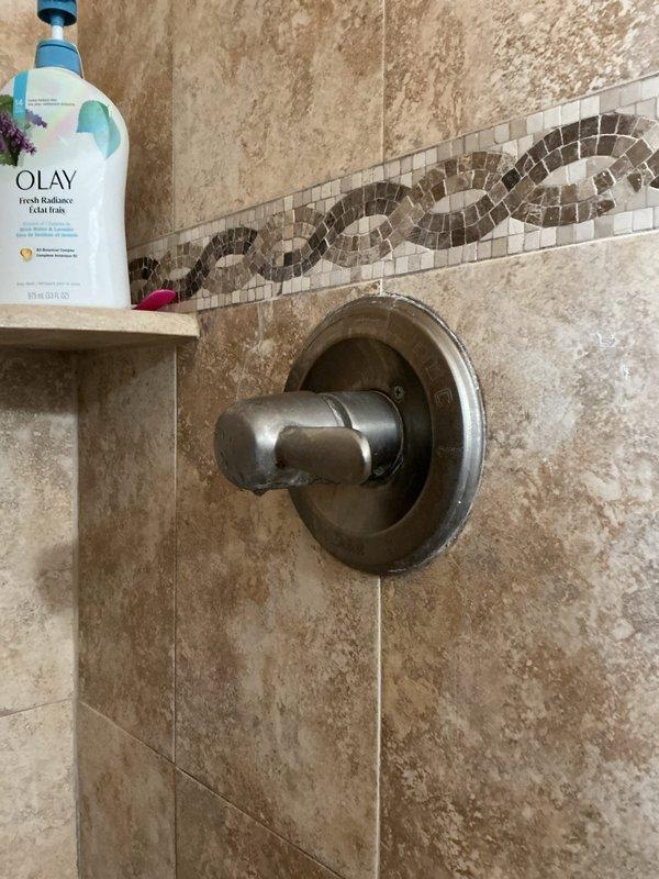 Responded to upstairs bathroom plumbing issues including a dripping showerhead and leaking toilet seal. Replaced faulty showerhead cartridge and installed new wax ring seal at toilet base, correcting previous unsuccessful repair attempt. Both fixtures tested and confirmed leak-free upon completion, with all work performed without requiring electrical power.