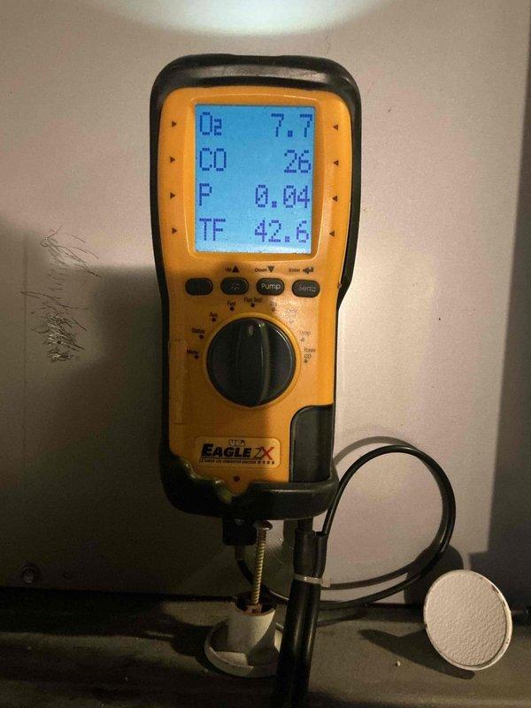 Completed comprehensive Gold Furnace Inspection on three forced-air furnace units at a multi-unit residential property, with two units located in the basement and one in the attic. All units are less than ten years old and were operational at time of inspection. Performed combustion analysis testing on each unit using diagnostic equipment, measuring oxygen levels, carbon monoxide output, draft pressure, and flue temperature to ensure safe and efficient operation within manufacturer specifications. All three furnaces passed inspection with readings indicating proper combustion and venting performance.