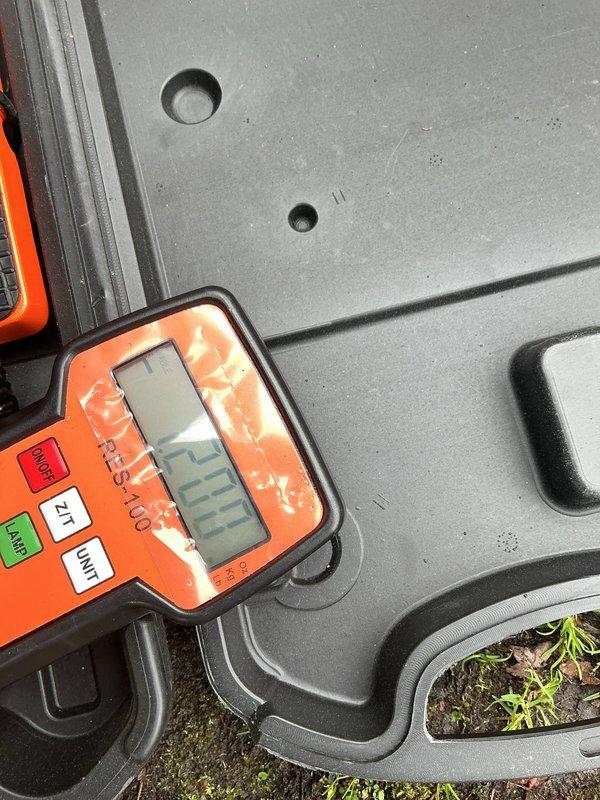 Completed comprehensive AC inspection on 6-year-old unit located in garage. Performed thorough evaluation of outdoor condenser unit, checking fan operation, electrical components, and overall system functionality. Inspected humidifier, thermostat, and hot water tank as part of complete system assessment. Unit found to be operational with normal wear consistent with age. Documented equipment condition with photos showing condenser exterior, fan guard assembly, and diagnostic measurements. All components functioning within acceptable parameters at time of inspection.