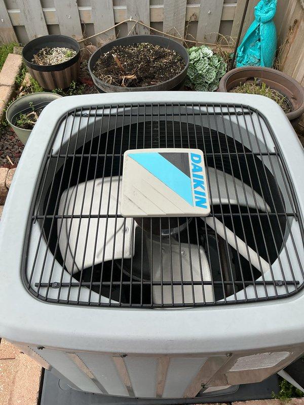 Responded to no-cooling complaint on 6-year-old Daikin split system. Performed diagnostic evaluation and determined condenser unit was not receiving power due to faulty contactor. Replaced defective contactor, verified proper voltage at disconnect, and tested system operation. Unit now cooling properly with condenser fan and compressor running within normal parameters.