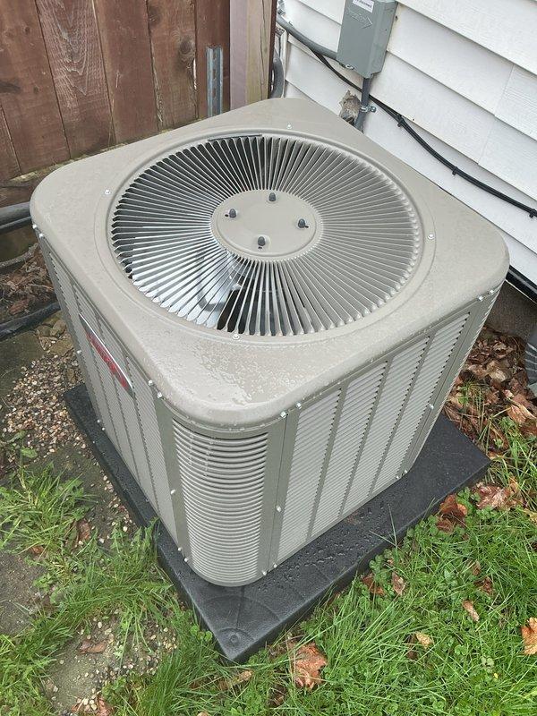 Completed comprehensive Gold AC Tune-Up on a one-year-old residential air conditioning system located at the rear of the property. Performed full system inspection including electrical connections, refrigerant levels, condenser coil cleaning, and airflow verification. Unit is operating within manufacturer specifications with all components functioning properly; no issues identified during this routine maintenance visit.