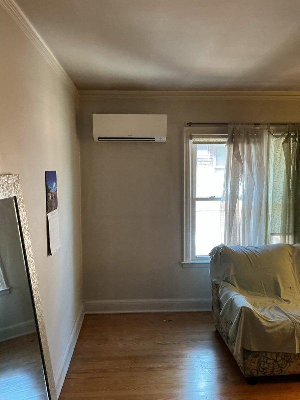 Completed three-day mini split system installation in residential property, including all necessary mechanical and electrical work with new dedicated circuit. Obtained required permits for mechanical, electrical, and mini split components, with indoor wall-mounted unit professionally installed in living area corner with proper refrigerant line routing and condensate drainage. All installation documentation and financing paperwork processed and submitted for final approval.