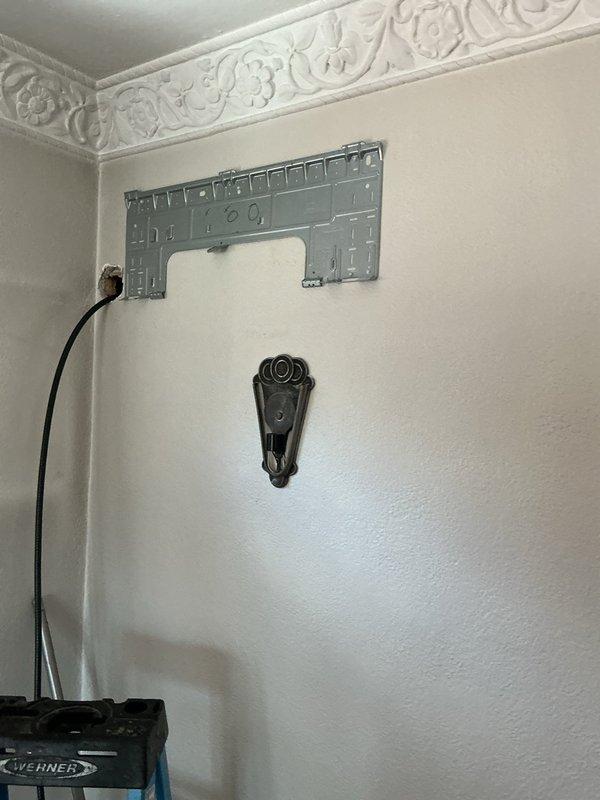 Completed three-day mini split system installation in residential property, including all necessary mechanical and electrical work with new dedicated circuit. Obtained required permits for mechanical, electrical, and mini split components, with indoor wall-mounted unit professionally installed in living area corner with proper refrigerant line routing and condensate drainage. All installation documentation and financing paperwork processed and submitted for final approval.