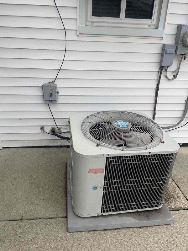 Conducted comprehensive assessment of 26-year-old HVAC system for full replacement estimate. Furnace evaluation revealed failed secondary heat exchanger with gas supply shut off for safety. Inspected Bryant air conditioning condenser unit located on exterior concrete pad and air handler system positioned in basement utility area, documenting existing equipment condition and installation configuration for complete system replacement proposal.