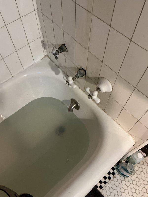 Responded to a returning customer's upstairs bathroom with a clogged toilet and slow-draining bathtub that had been problematic for two days. Upon arrival, assessed the 50-60 year old home's plumbing system and identified drainage issues affecting both fixtures. Successfully cleared the blockages in the toilet and bathtub drain line, restoring proper water flow and drainage function to both fixtures.