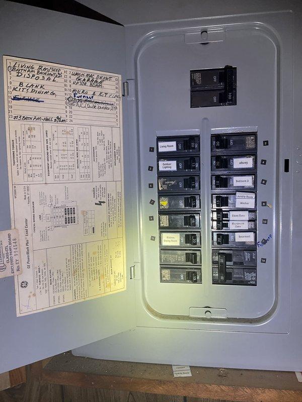 Performed seasonal air conditioning system start-up for Lennox condensing unit with basement evaporator coil installation. Labeled electrical circuit breaker for AC/furnace system in main panel for proper identification. Noted unit requires releveling with pea gravel pad adjustment on return visit to ensure proper drainage and equipment stability.