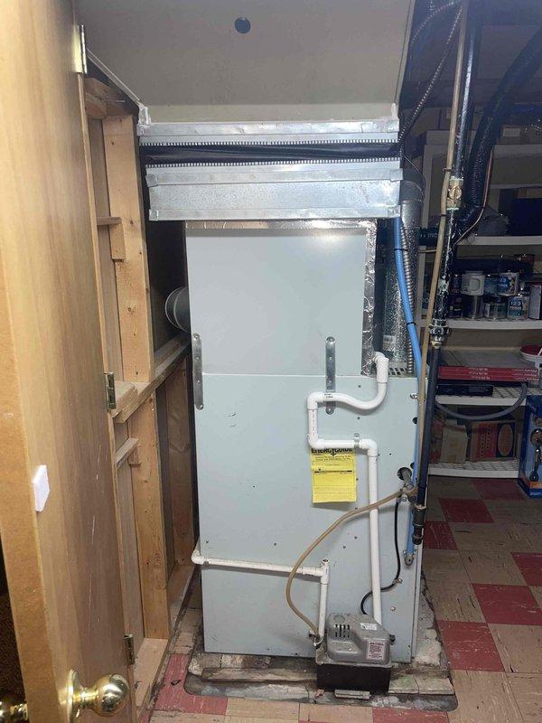 Responded to service call for central air conditioning system with no cooling capacity and minimal airflow despite unit operation. Upon inspection of the indoor air handler unit and system components, assessed the condition of the existing HVAC equipment including ductwork connections, refrigerant lines, condensate drainage, and electrical connections. Documented equipment specifications and provided estimate for complete system replacement due to system failure and inability to maintain adequate cooling performance.