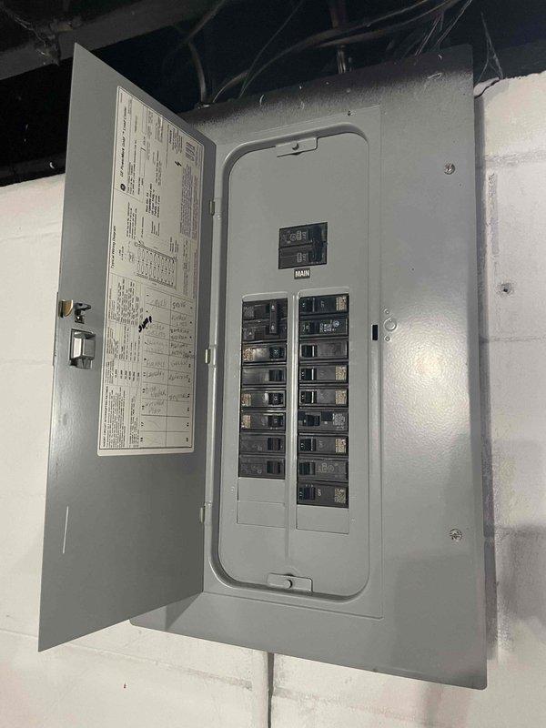 Conducted on-site evaluation for central air conditioning system installation at residential property currently equipped with forced air heating infrastructure. Assessed existing electrical service panel capacity and available breaker positions to determine compatibility for new AC condenser and air handler requirements. Evaluated basement utility area for optimal air handler placement and verified existing ductwork configuration to establish integration points for cooling distribution through the established forced air system.