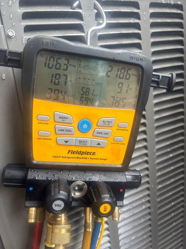 Performed air conditioning system startup and commissioning following scheduled appointment coordination. Connected refrigerant manifold gauges to measure system operating pressures and temperatures. Liquid line pressure reading showed 218.6 PSI while suction line pressure measured 106.3 PSI. Verified proper refrigerant charge by referencing manufacturer subcooling values chart and comparing actual operating conditions against normal operating pressure tables. Monitored system temperatures including superheat and subcool readings to ensure unit was operating within specifications. Documented all pressure and temperature readings using digital manifold gauge set. System startup completed successfully with all parameters within acceptable ranges per manufacturer guidelines.