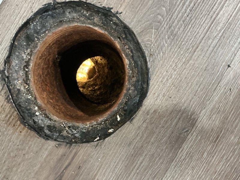 Performed camera inspection on clogged basement laundry room drain that had been experiencing ongoing drainage issues. Video inspection revealed significant blockage at approximately 41.5 feet into the line, with fibrous material and debris accumulation identified as the primary cause of the obstruction. Inspected drain opening and pipe penetration point, noting corroded metal piping with rust buildup that may contribute to future drainage concerns.