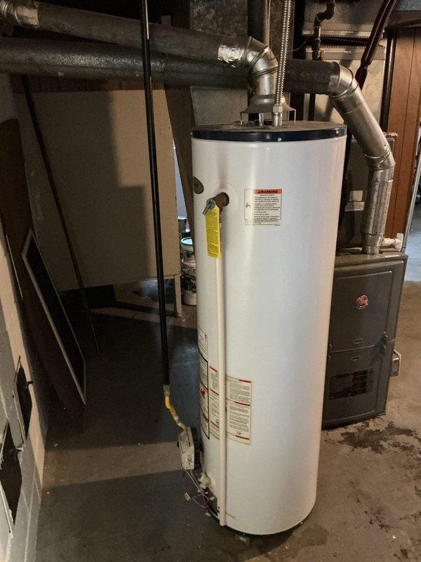 Responded to service call for Honeywell gas water heater with pilot light malfunction. Upon arrival, performed diagnostic inspection of the tank-style water heater located in basement mechanical room. Inspected pilot assembly, thermocouple, gas control valve, and burner components to identify cause of pilot light failure. Tested gas supply line pressure and verified proper ventilation. Cleaned pilot orifice and burner assembly of debris and carbon buildup. Checked thermocouple positioning and electrical continuity to ensure proper flame sensing. Adjusted pilot flame height to manufacturer specifications and verified main burner ignition sequence. Tested temperature and pressure relief valve operation and confirmed all safety controls functioning correctly. Verified water heater returned to normal operation with pilot light remaining lit and main burner cycling properly. Unit left in safe operating condition.